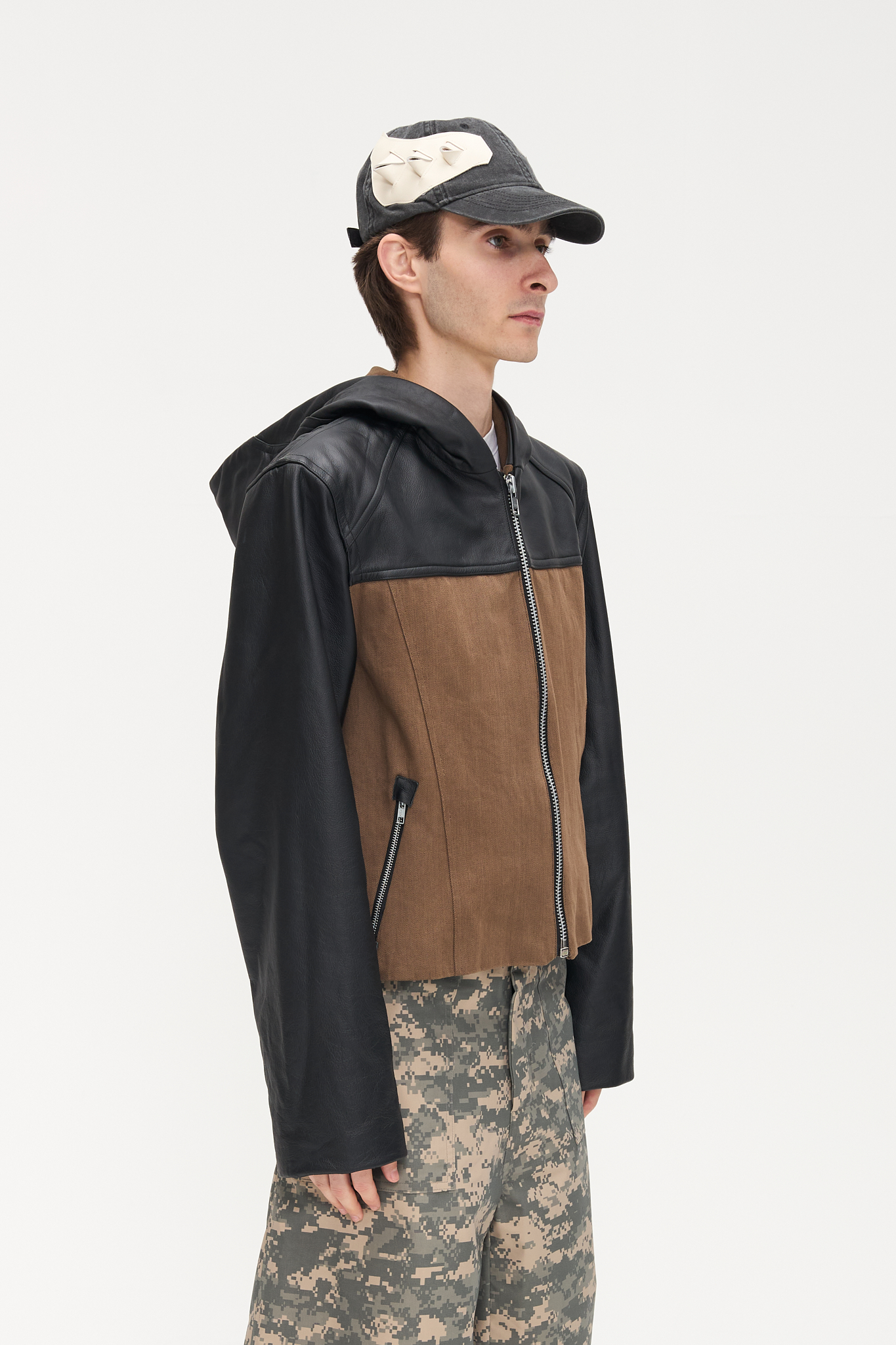 - Oversize fit <br />- Leather hodded jacket<br />- Deadstock brown denim