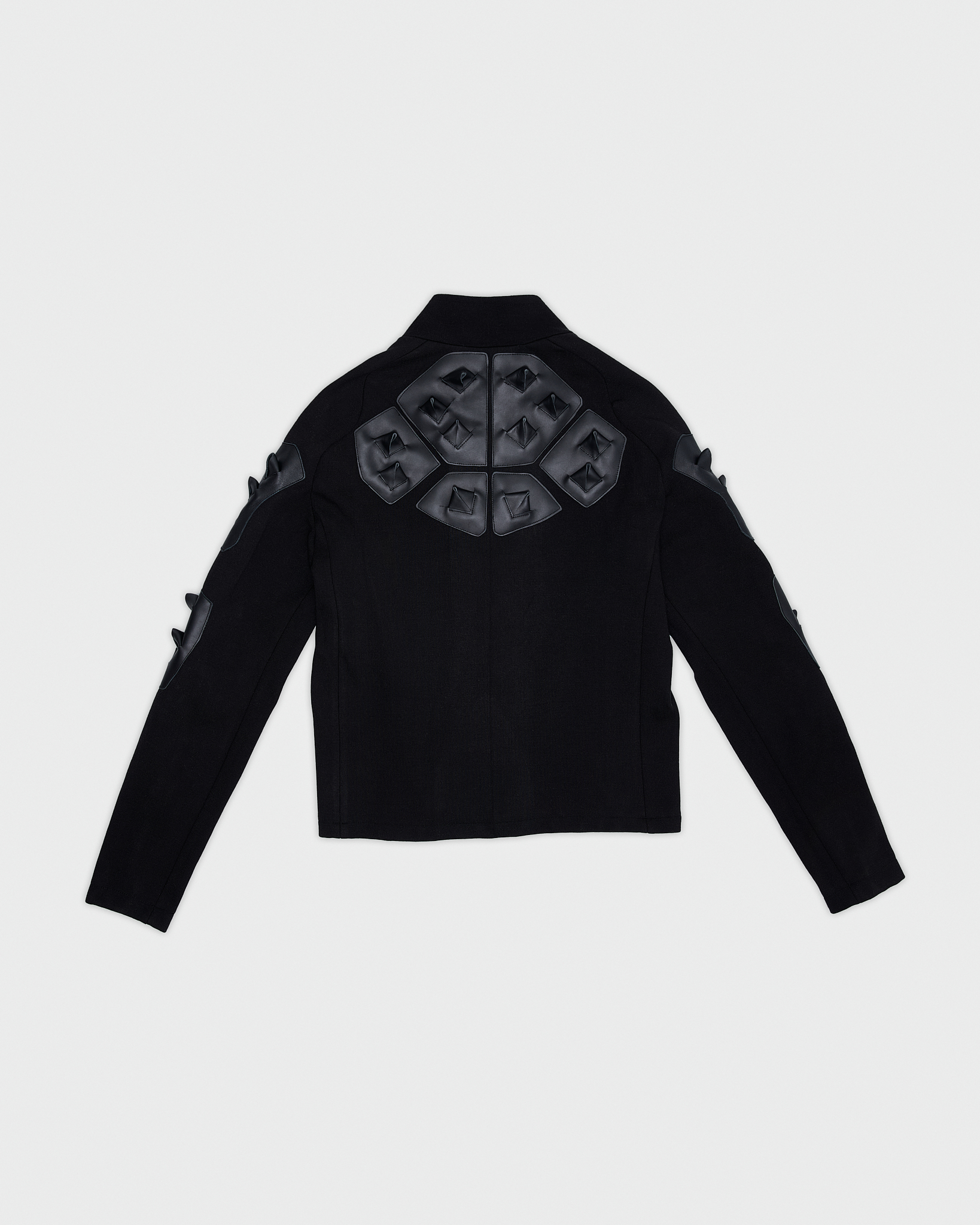 - Full zip pull over <br />- Slim fit<br />- Croco 3-D leather patches