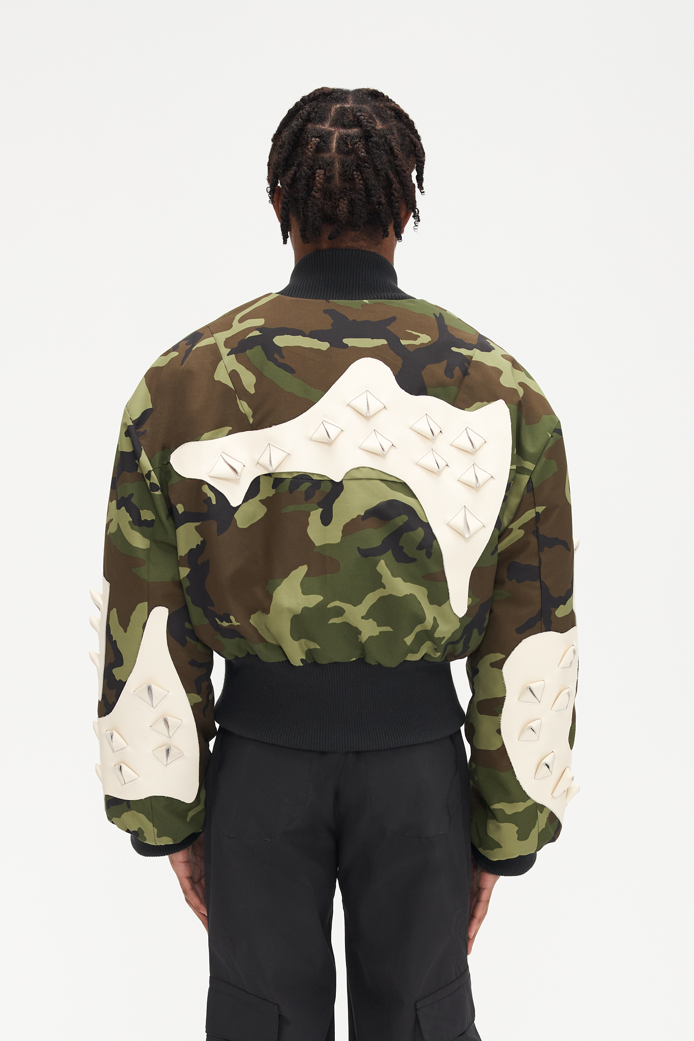 - Oversize fit<br />- Croptop bomber<br />- Nylon water resistant fabric<br />- White croco 3-D natural leather patches<br />