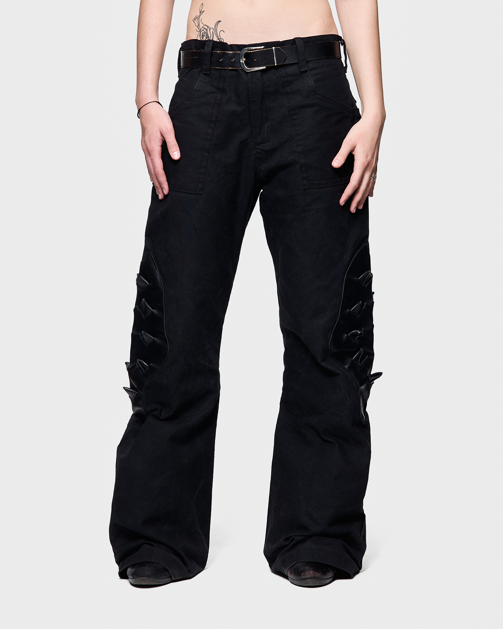 - Slim fit with bootcut leg pants<br />- No side seam<br />- Croco 3-D leather patches
