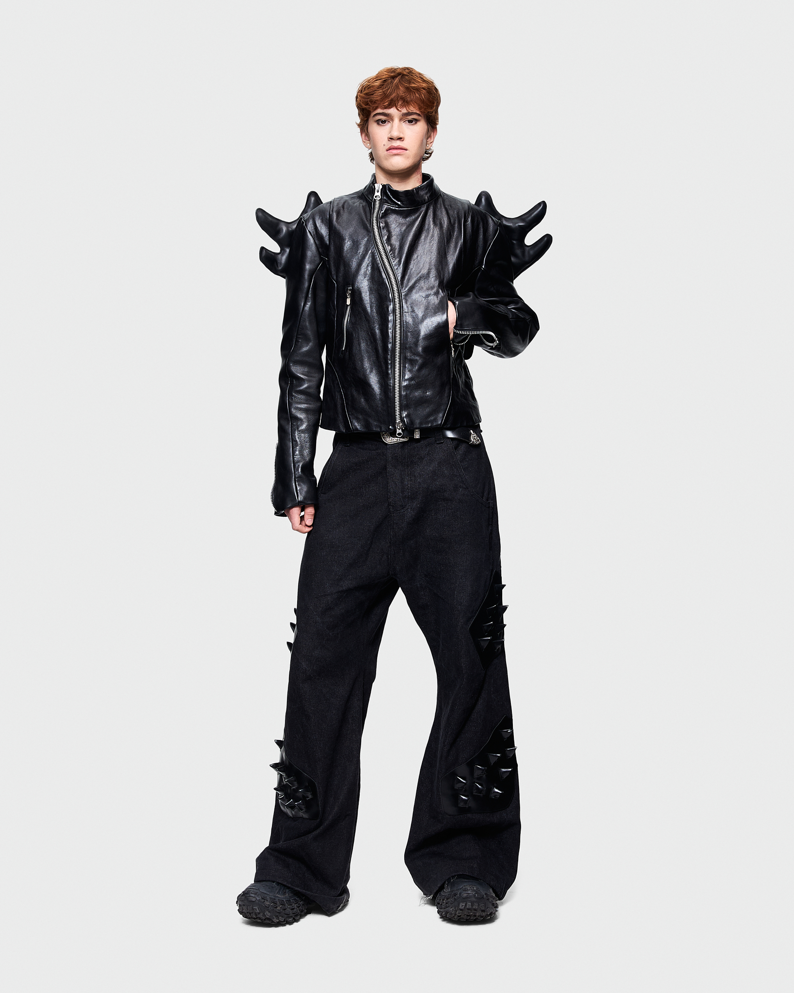 - Biker leather jacket<br />- Straight fit <br />- Back feature detachable leather wings<br />- Off center zipper