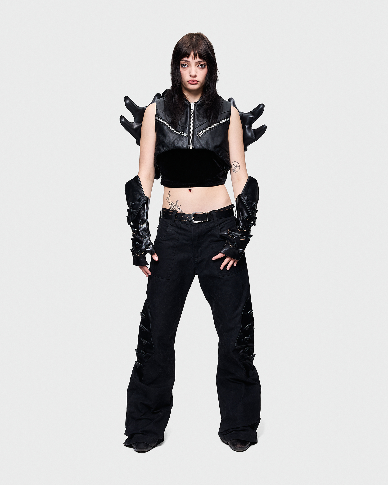 - Slim fit with bootcut leg pants<br />- No side seam<br />- Croco 3-D leather patches