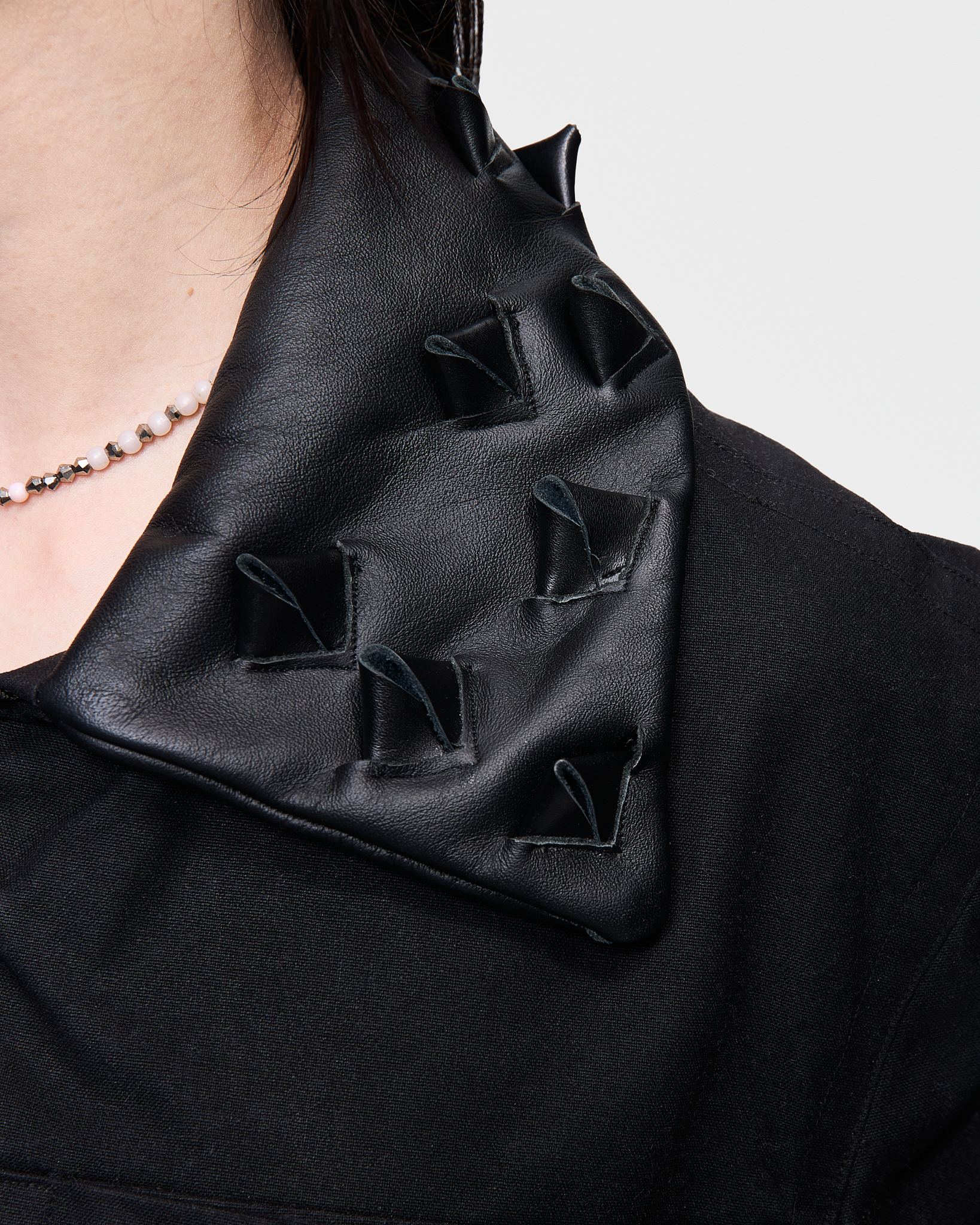 - Canvas Workwear jacket<br />- Straight fit<br />- Leather collar detailed with inlaid croco spikes