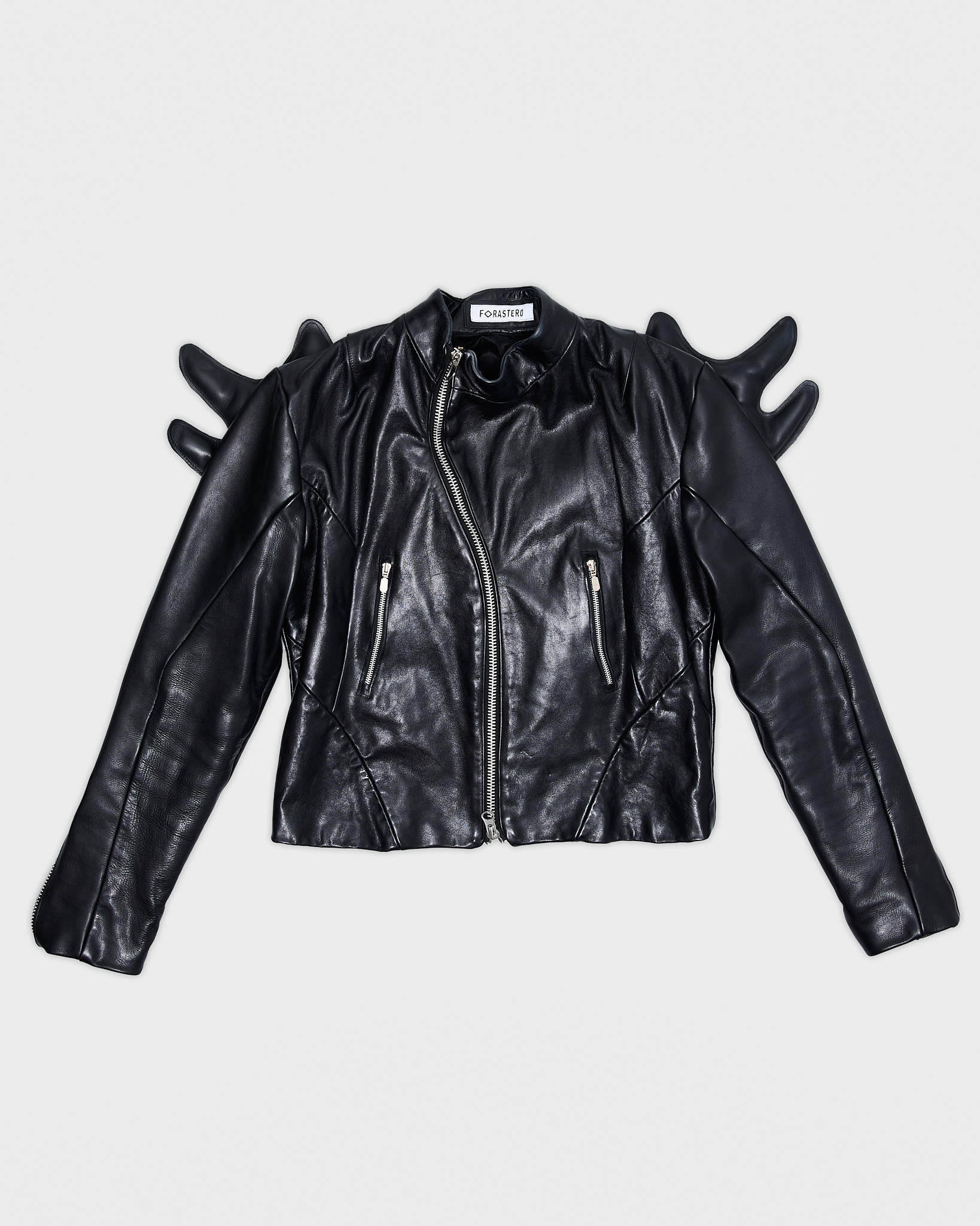 - Biker leather jacket<br />- Straight fit <br />- Back feature detachable leather wings<br />- Off center zipper